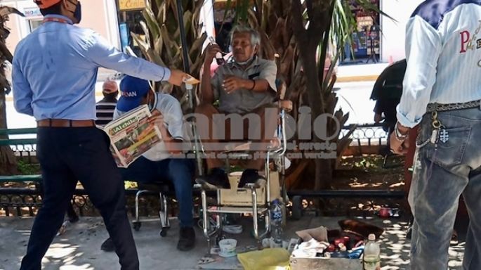 Grave situación de los "limpia botas" de la Plaza Grande
